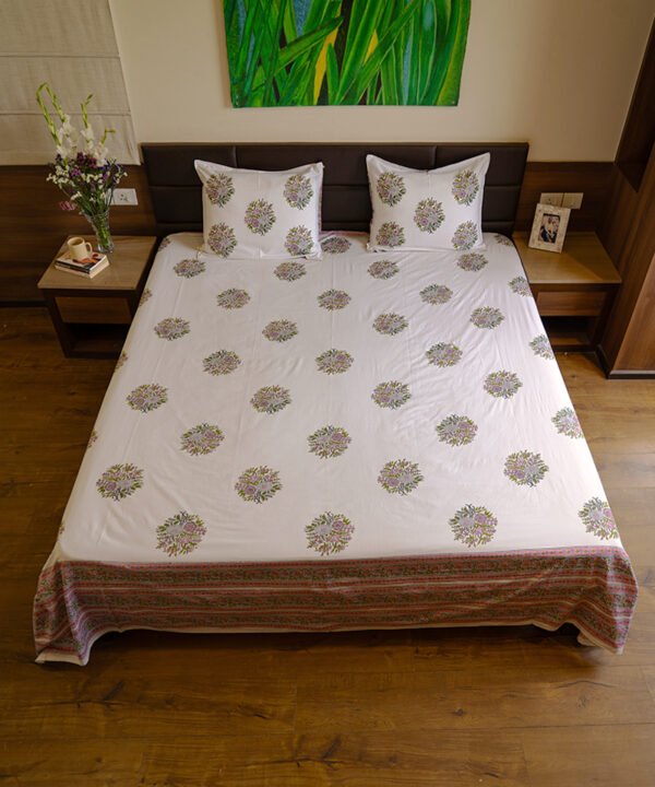 A Peaceful Elegant Bedroom with king size double bed draped with kalaaai's organic cotton hand block printed white bed sheet.