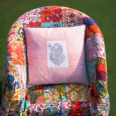 Peach ethnic paisley design cushion cover in organic cotton hand block printed by Inida's best kalaaai studio. reversible cushion cover