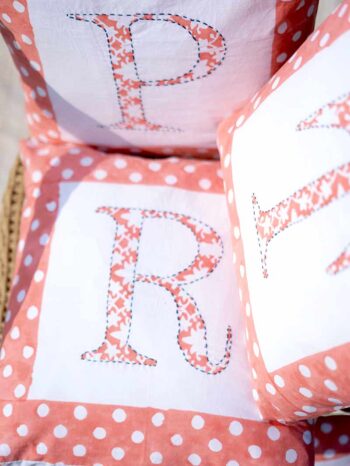 Hand block printed personalised Initial cushion cover in organic cotton fabric by India's best handicraft manufacturer, kalaaai studio. reversible cushion cover.