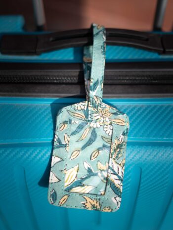 Heritage Traveler Upcycled Fabric Story Tags. Features traditional Indian prints such as Hand-Block prints. Artisan-made, cultural travel accessory.