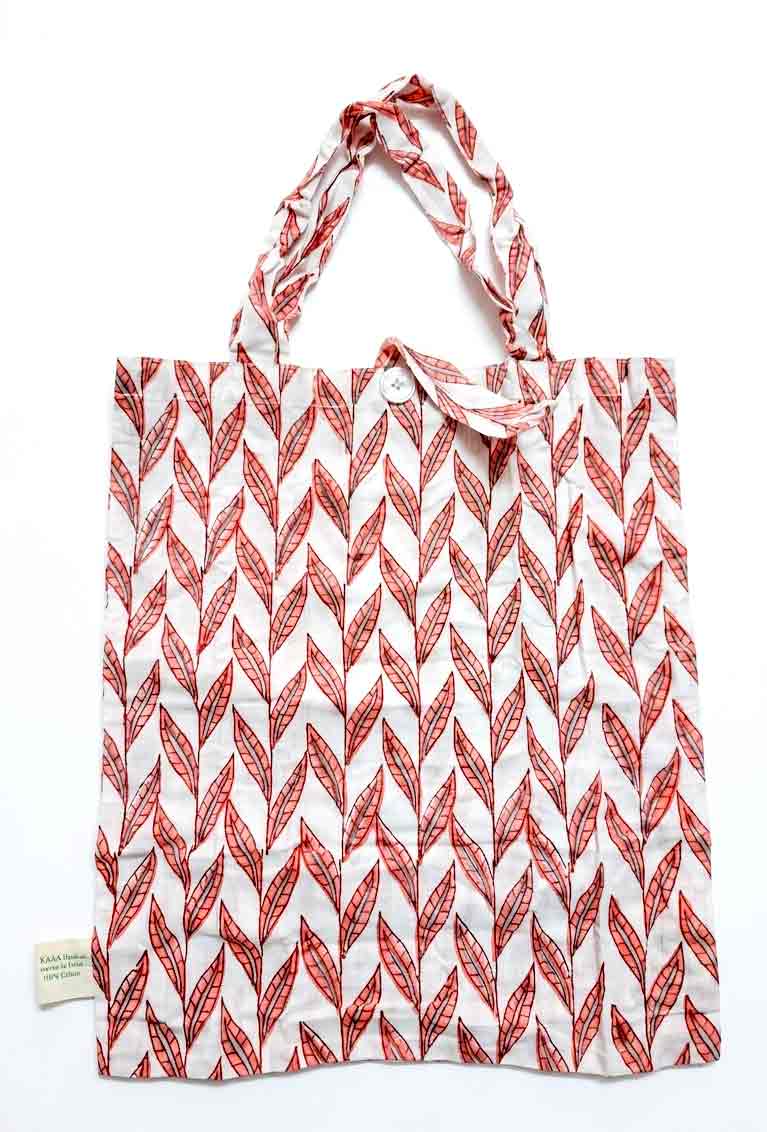orange-and-whte-kalaai-bag Kalaai Studio Tote Bag with hand block printed fabric in beautiful orange and white color floral print. compactible bag to fit your pocket for an easy sustainable lifestyle. eco friendly corporate gift