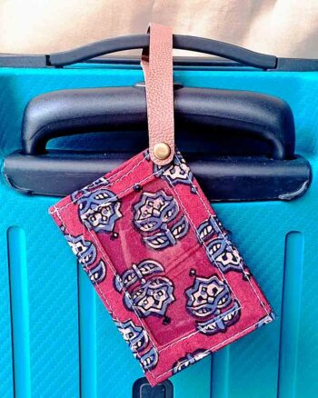 Sustainable fabric luggage tag in assorted red colour prints