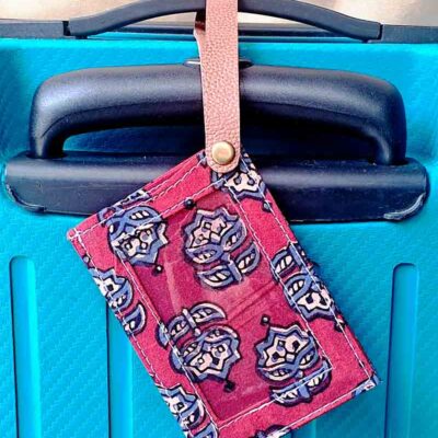 Sustainable fabric luggage tag in assorted red colour prints